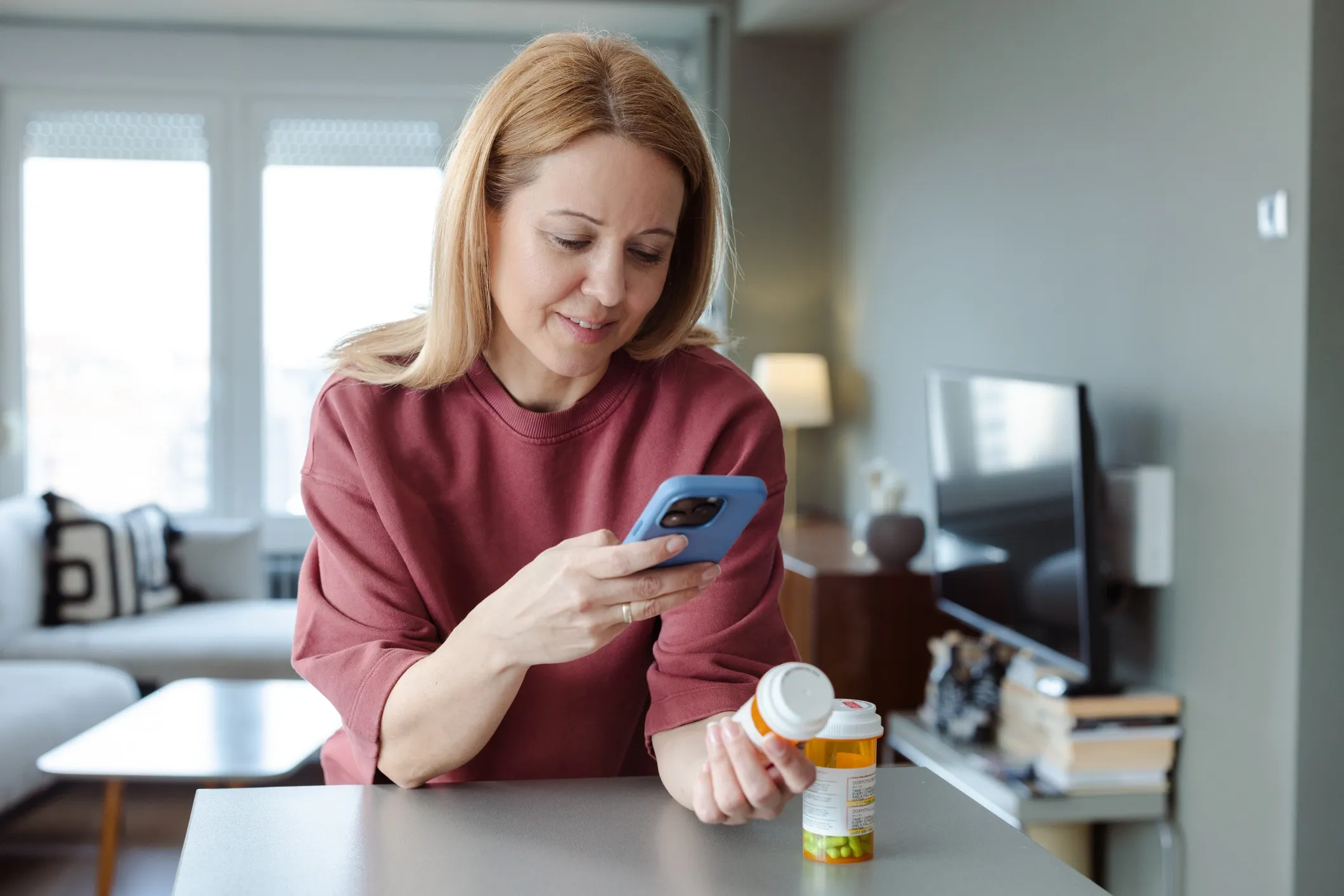 Person contacting pharmacy via phone